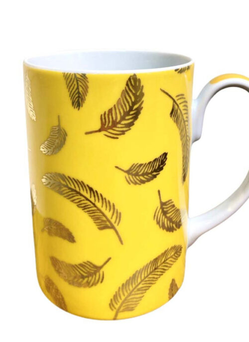 Yellow mug with feathers